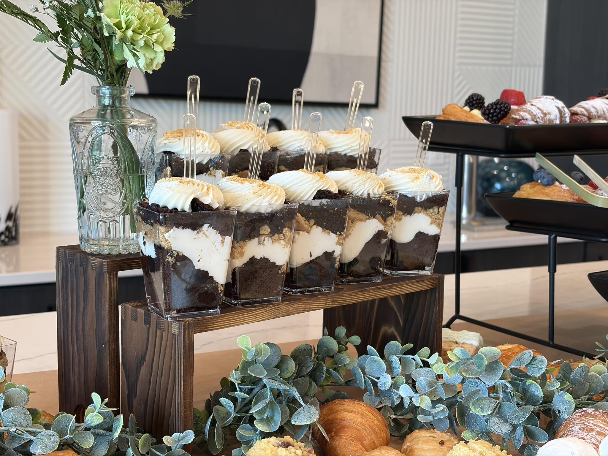 Layered chocolate desserts and cupcakes at the bakery